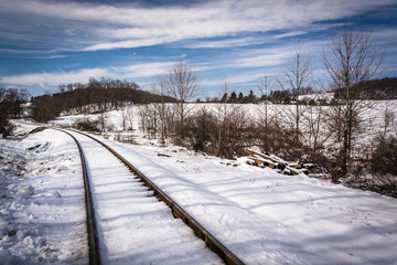 Snow covered railroad tracks in rural Carroll County, Maryland.