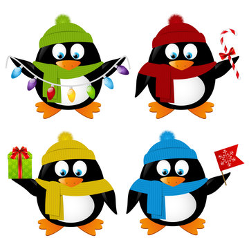 Set of funny cartoon Xmas penguins