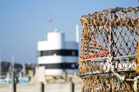 Close up picture of a lobster cage in a fishing village
