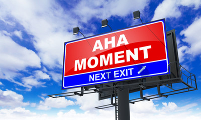 Aha Moment on Red Billboard.