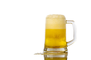 Frosty glass of light beer set isolated on a white background