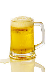 Frosty glass of light beer set isolated on a white background
