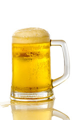 Frosty glass of light beer set isolated on a white background