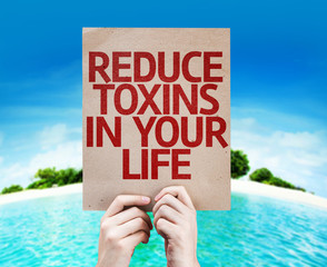 Reduce Toxins In Your Life card with a beach background