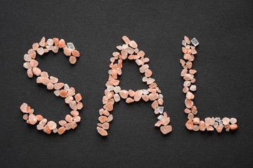 Word Sal written in pink Hymalayan salt crystals