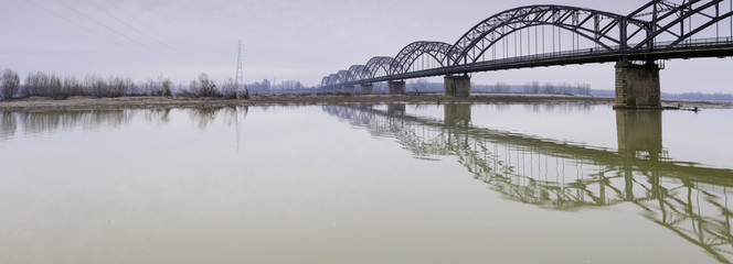 Gerola Bridge on the Po river, wintertime. Color image