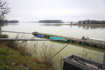 Naklejka premium Po river winter panorama. Color image