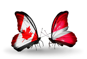 Two butterflies with flags Canada and Latvia
