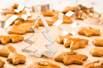 Christmas gingerbread cookies with cutter. Shallow DOF.