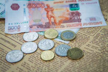 russian roubles banknotes and euro and dollars coins