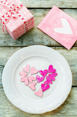 Valentine's background with gift, plate and card