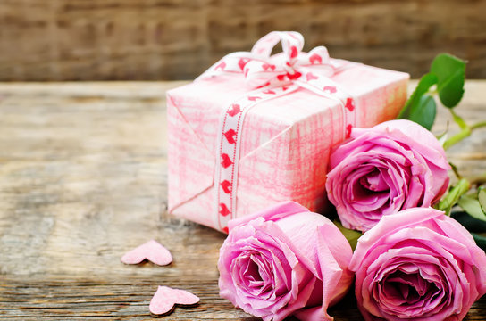 Valentine's background with gift and flowers