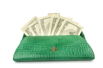 women's purse with money on a white background