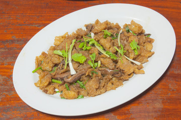 Closeup of stiir-fried fish maw with Shiitake mushrooms