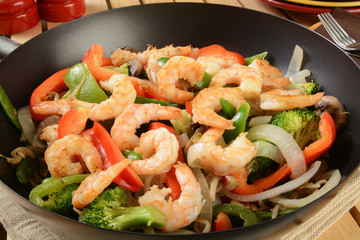 Shrimp stir fry in a wok