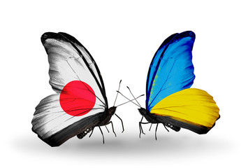 Two butterflies with flags Japan and Ukraine