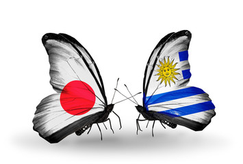 Two butterflies with flags Japan and Uruguay
