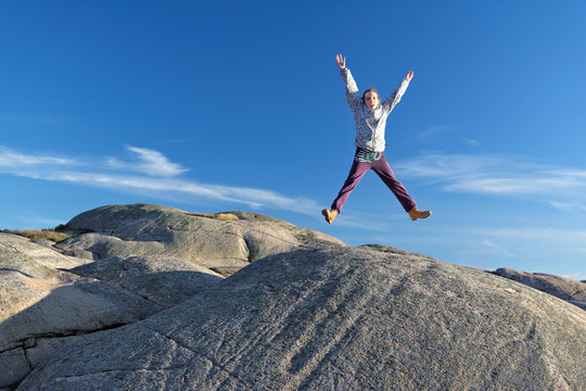 young girl jumping