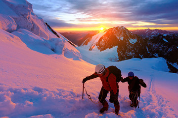 climbers at the top of a pass