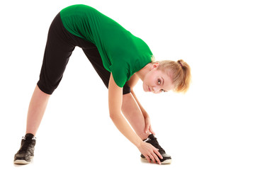 Fototapeta premium Sport. Flexible fitness girl doing stretching exercise