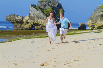 Loving Wedding Couple on Ocean Coastline.