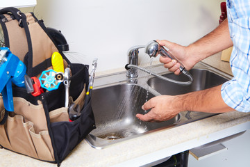 Plumber on the kitchen.
