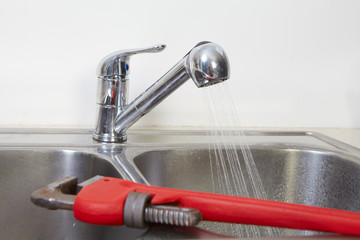 Kitchen Water tap and sink.