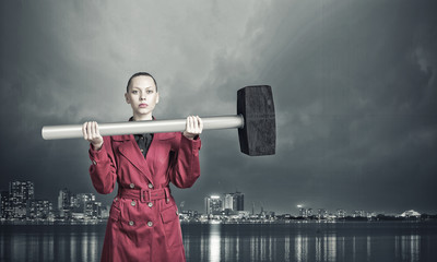 Woman with hammer © Sergey Nivens