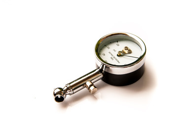 Tire pressure gauge isolated white background