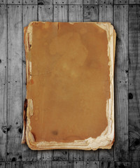 Vintage book on wood with clipping path.