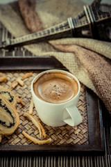 Cup of espresso coffee and Butterfly Pie