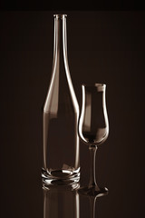 bottle and glass on white background