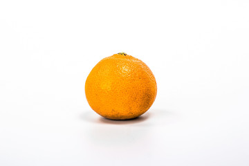 whole mandarin isolated on white background