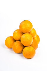 Pyramid of oranges isolated on a white background