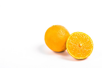 one mandarin and half fruit