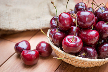 Fresh red Cherries on wooden