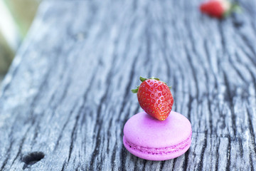 French macaroons with strawberry fruit.