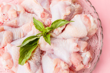 raw chickens on plate