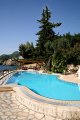 swimming pool near by sea blue water clear pure