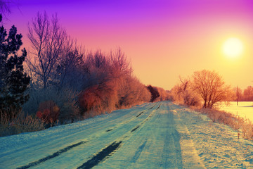 Beautiful winter sunrise over road