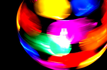 motion blurred disco ball on black