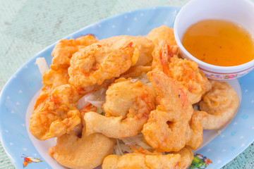 fried shrimp meat ball with sweet sauce on wooden table
