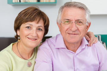 Closeup of Seniors couple looking at camera