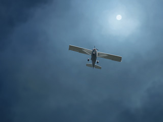 airplane in a stormy sky