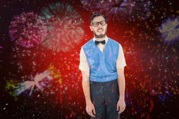 Composite image of geeky hipster pulling a silly face