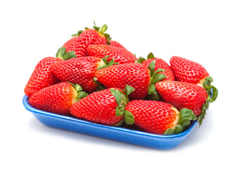 packed strawberries isolated on white