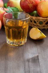 apple cider or juice in a glass and space for text