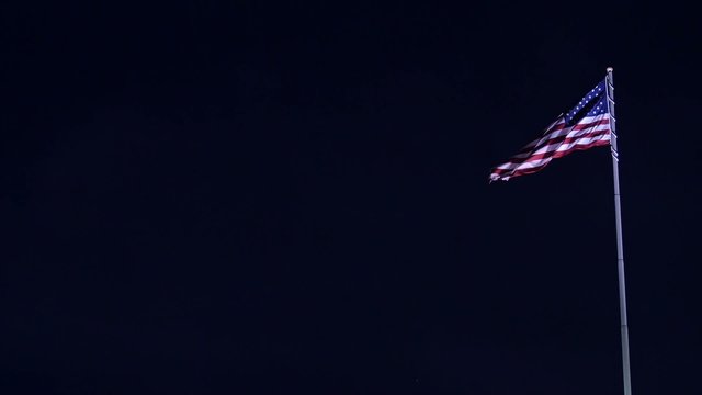 American flag at night