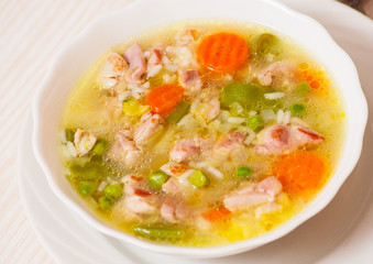 soup with meat, vegetables and rice