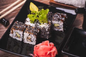eel sushi roll with sesame seeds